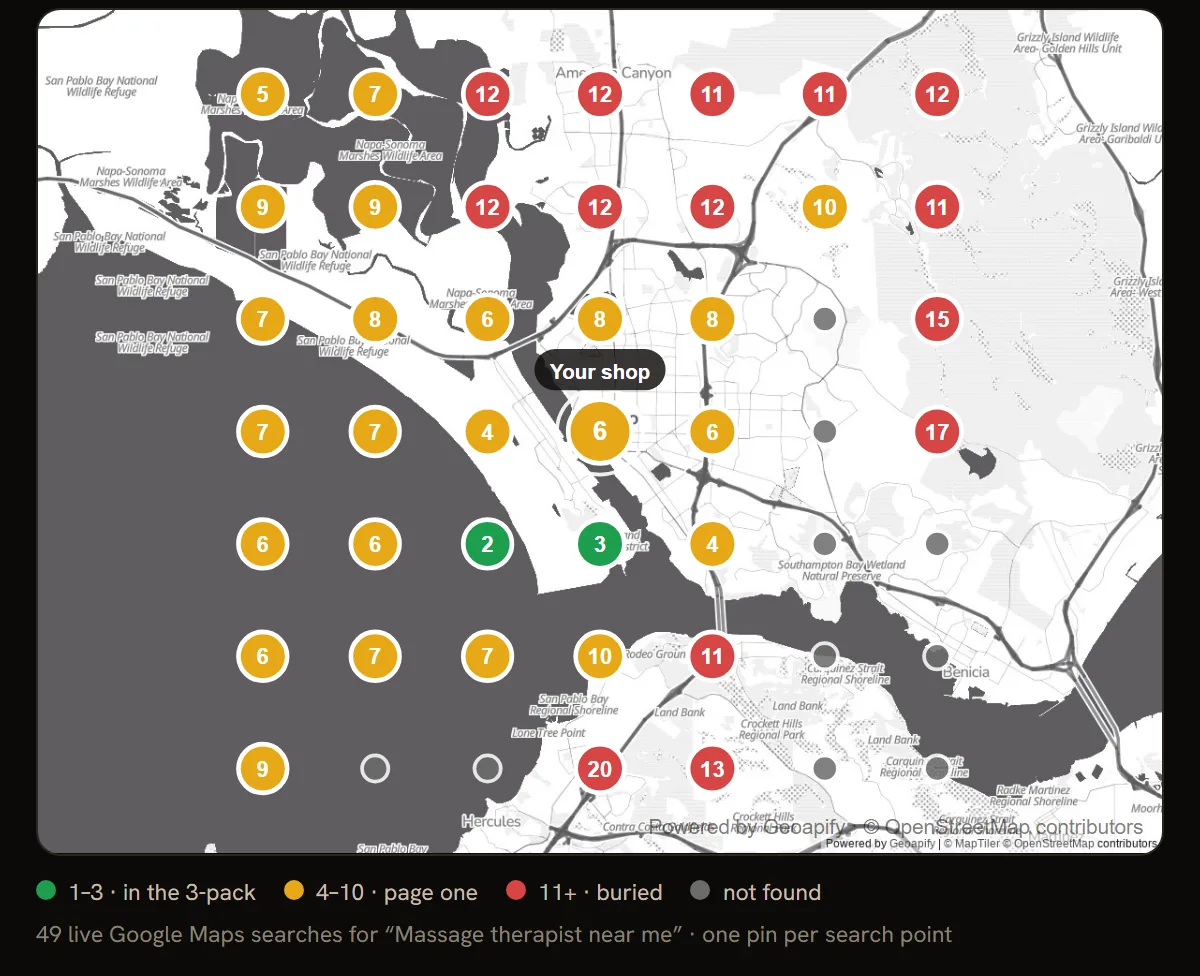 A real audit ranking grid: 49 points across a city map, each colored green, yellow, red, or grey by how the business ranked in a live Google Maps search at that spot